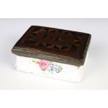 An antique enamel trinket box with floral decoration an decoratively inlaid wooden lid, initialed
