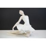 Royal Dux figure of a kneeling ballerina, no. 22215, 19cm high (with Royal Dux paper label)