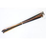 Five early 20th century wooden walking sticks to include three silver mounted examples (featuring