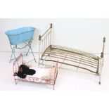 Two vintage metal dolls bed frames together with a dolls bath.