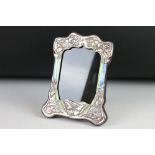 A silver and enamel art nouveau style easel back picture frame