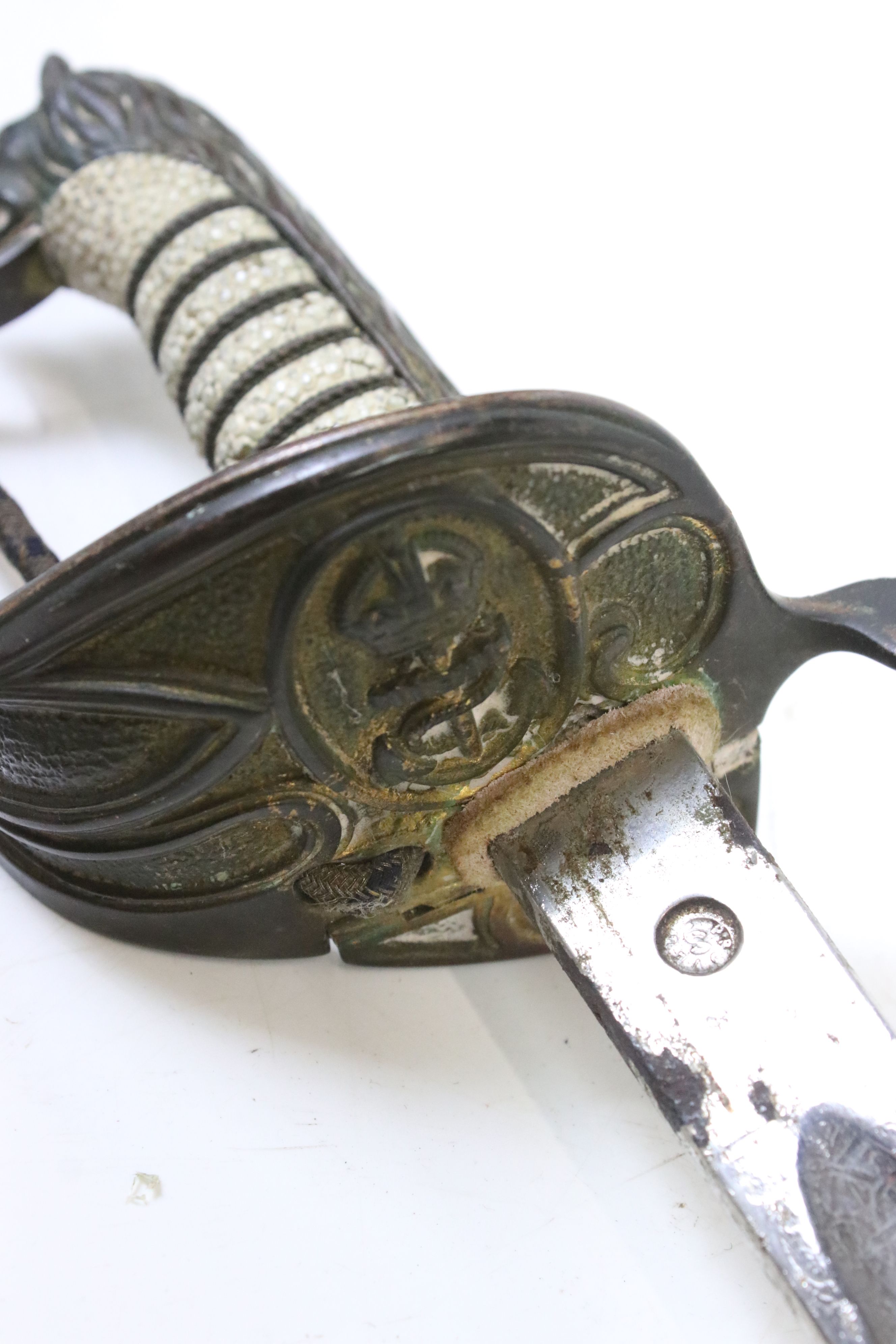 A Royal Navy officer's dress sword, lion head pommel, navy cypher with the kings crown, shagreen - Image 5 of 7