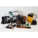 Assorted cameras and binoculars to include Panasonic LC80, Zenit E camera, Fujifilm DL 270 zoom,