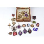 Collection of pocket watch fobs and yellow metal charms etc.