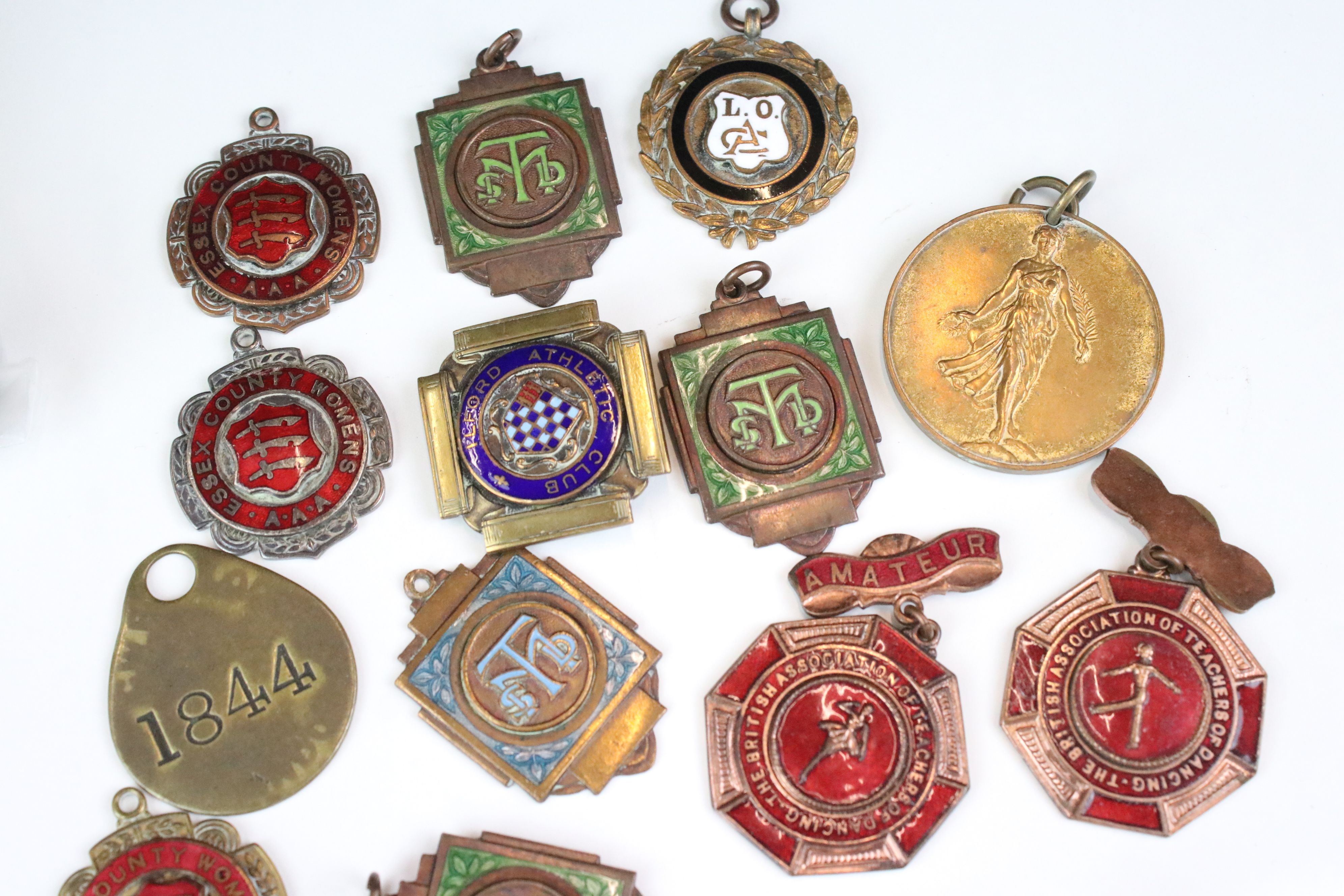 A small group of mixed collectables to include military buttons, a quantity of medallions and - Image 6 of 8