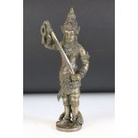 Hindu bronze figure of a deity stood holding a weapon, approx 19cm high