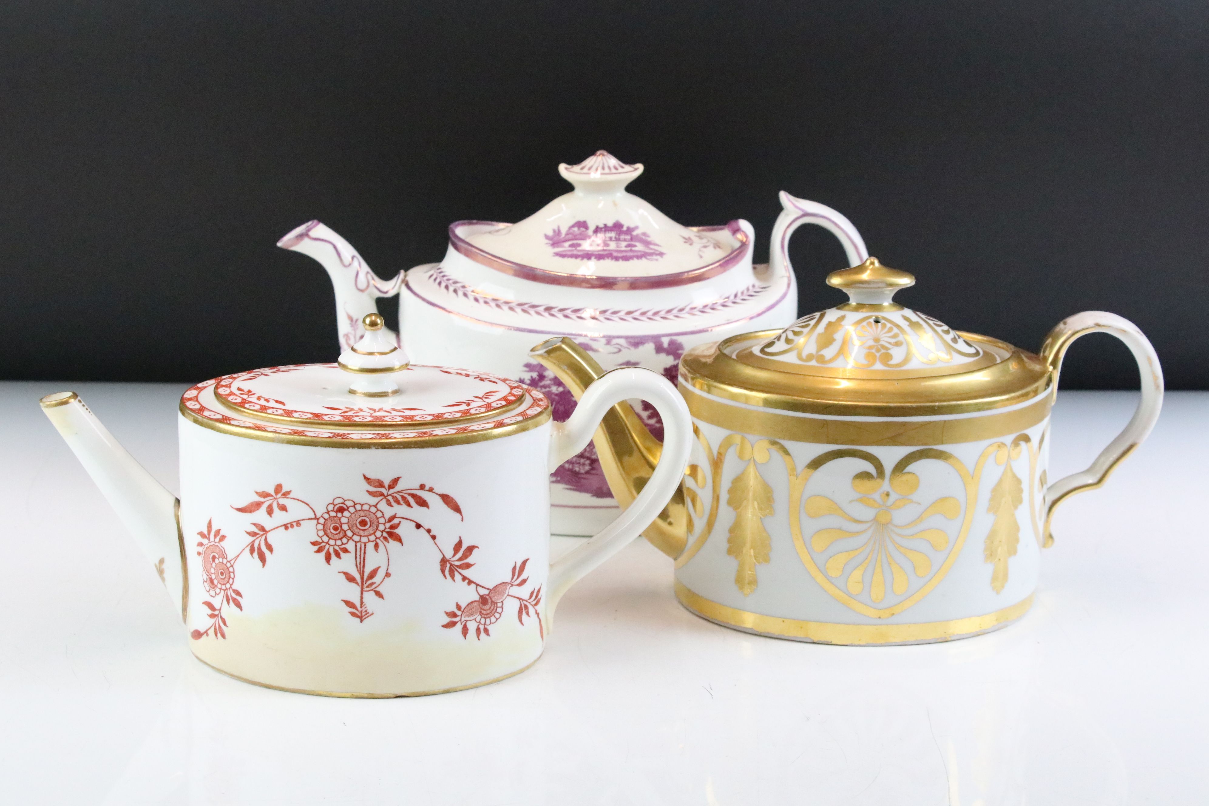 Three 19th Century teapots to include a Victorian Minton Delft teapot with red transfer printed