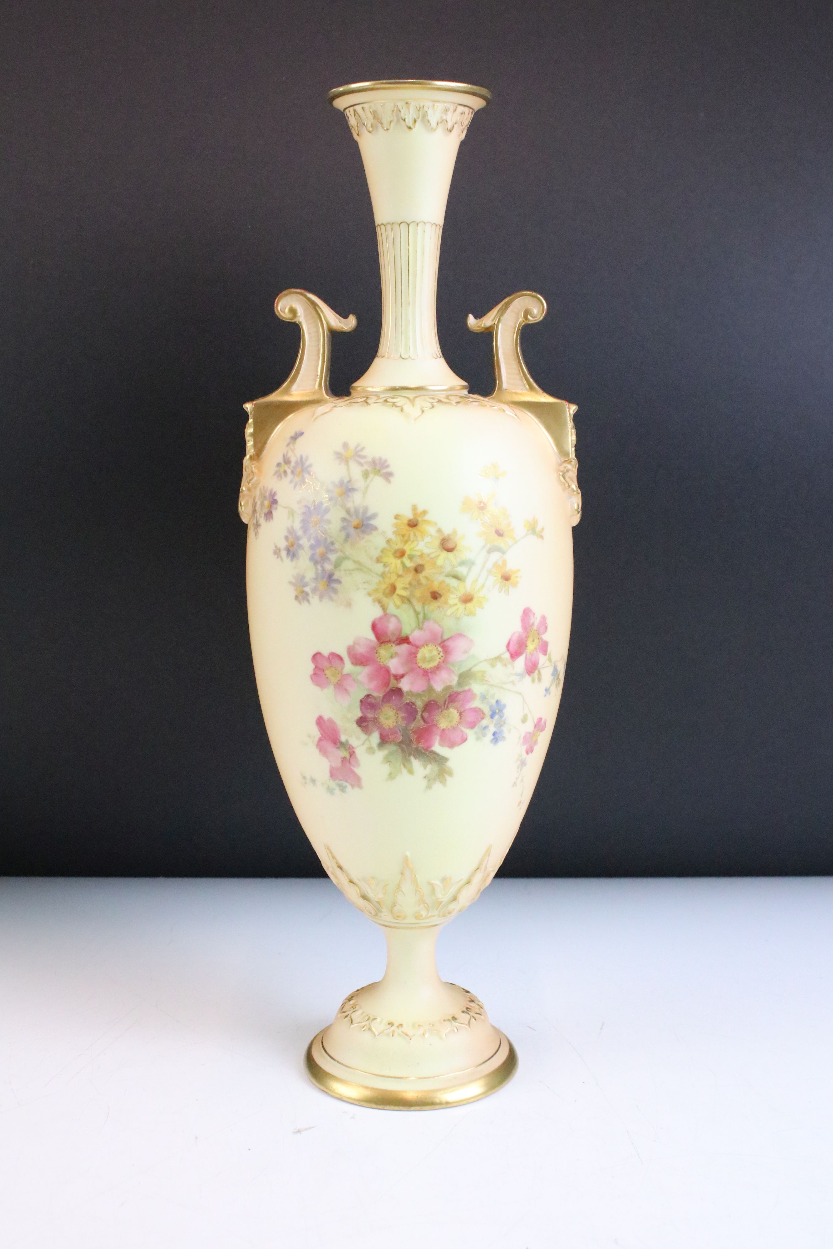 19th Century ivory blush amphora twin handled vase. The vase having moulded handles with gilt