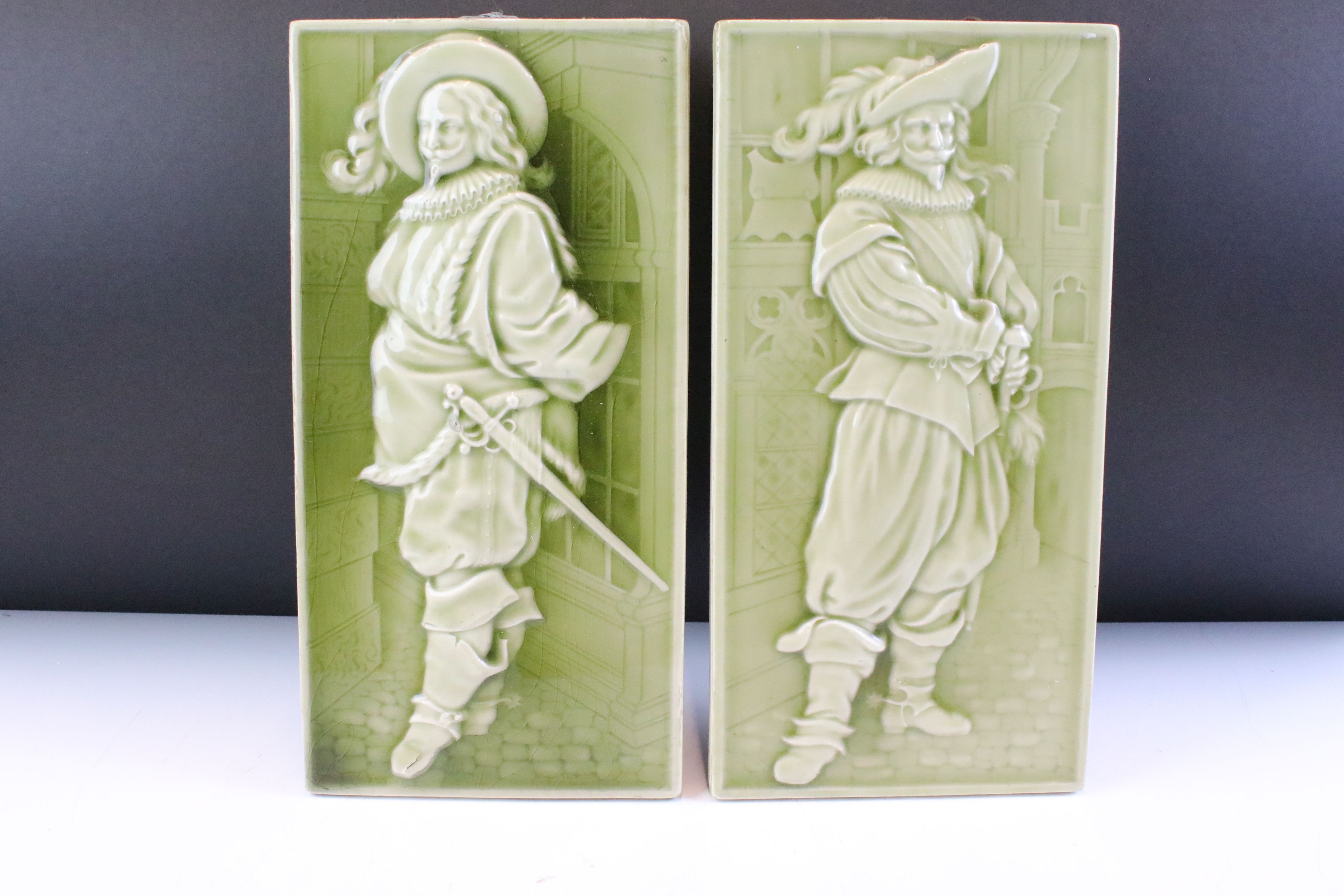 Pair of 19th Century Minton's Cavalier majolica tiles having raised moulded detailing featuring