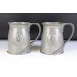 Pair of early 20th century "Tudrio" pewter tankards, of bombe cylindrical form with bi-furcated