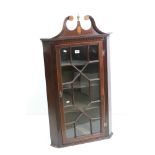 George III style Mahogany Hanging Corner Cabinet with inlaid swan neck pediment and single