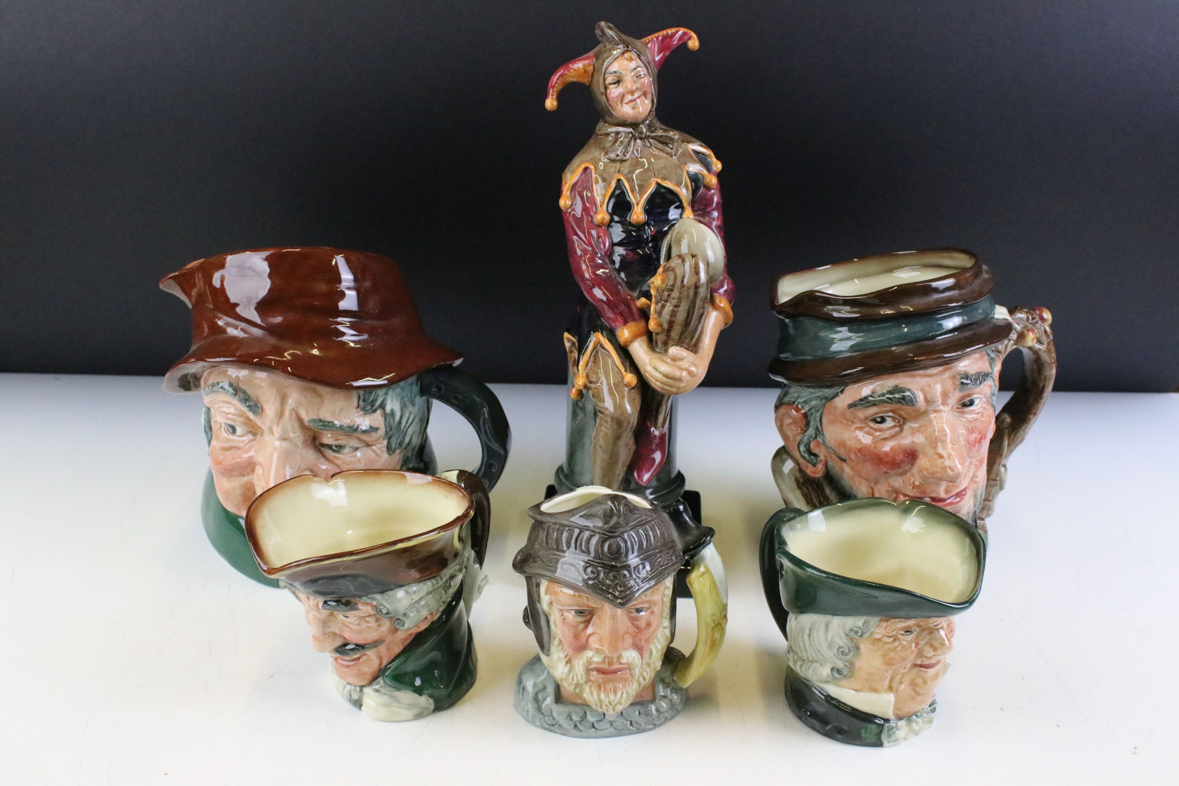 Group of Royal Doulton ceramics to include a Jester figurine (HN 2016), three small character jugs