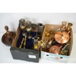 A large collection of mixed brass and copper ware to include kettle, vases, candlesticks...etc.