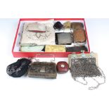 A collection of vintage purses to include leather, mother of pearl and beaded examples.