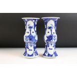 Pair of Chinese blue and white Gu vases being hand painted in the prunus pattern with panelled