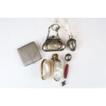 A small group of collectables to include a silver plated finger purse, hallmarked silver rattle in