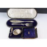 A cased fully hallmarked sterling silver scalloped butter dish and knife together with a silver
