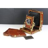 Gandolfi wooden and brass plate folding camera and slides. Lens marked Schneider- Kreuznach Xenar