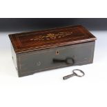 Nicole Freres 19th century 4-airs music box, housed within a rosewood case with box wood inlay to