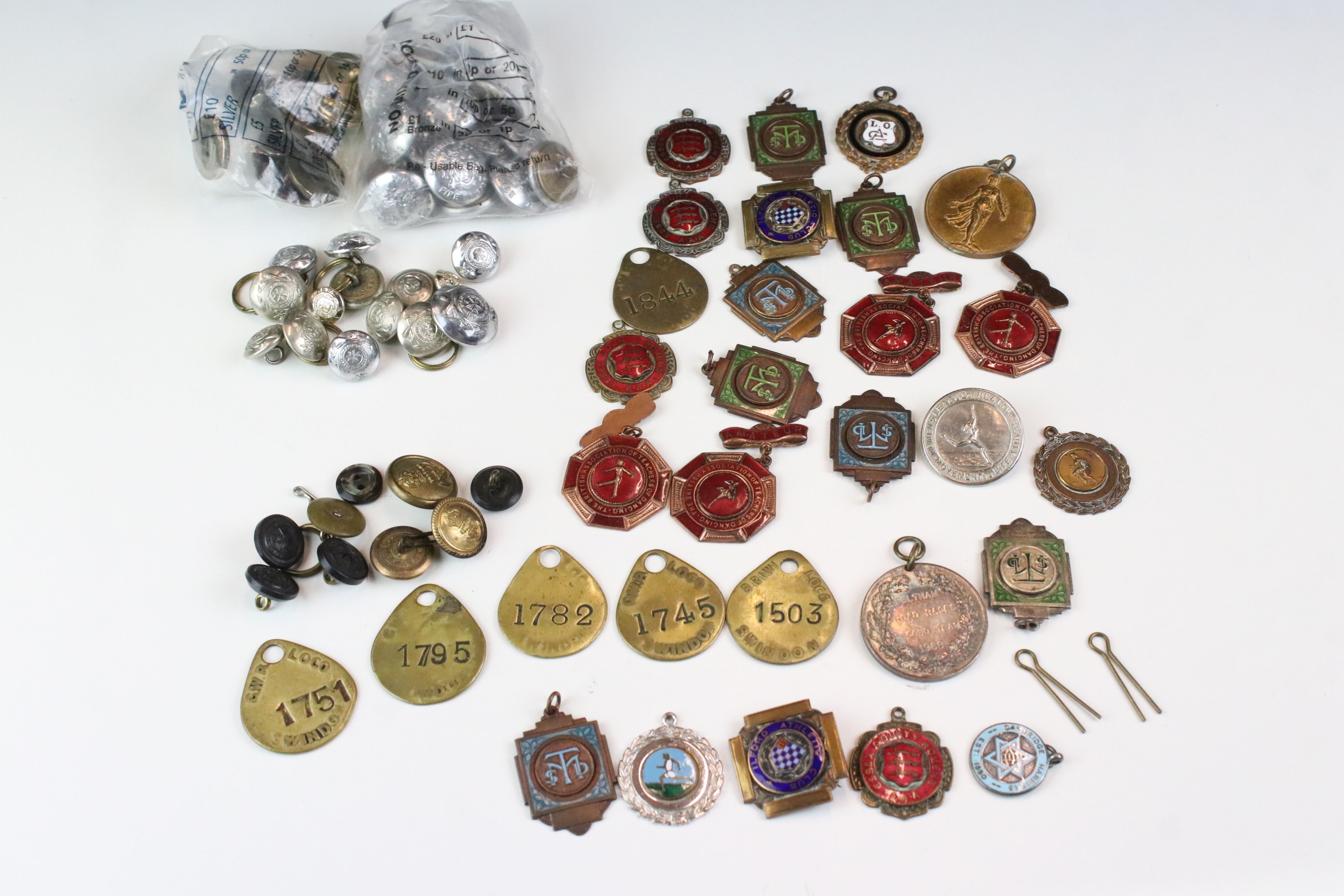 A small group of mixed collectables to include military buttons, a quantity of medallions and