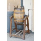 Early 20th century Coopered and Iron Bound Oak Butter Churn on a Pine Stand, the churn with label