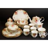 Royal Stafford ' Bouquet ' part tea and dinner service, comprising: a teapot and cover, sugar