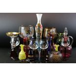 Three Cranberry glass decanters / jugs, a ruby and clear glass cut glass shade, 10cm high and a
