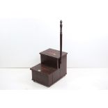 Walnut set of library steps of box form on brass castors, 40cm wide x 107cm high