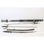 A collection of five swords to include two fencing foils and two reproduction Japanese swords.