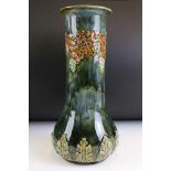 Late 19th Century Royal Doulton vase having raised grape vine detailing and a green drip glaze.