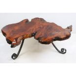 Contemporary Coffee Table by Swamp Kauri, the top formed from a section of Tree Trunk, raised on thr