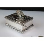 A 925 sterling silver cased anatomical music box with pop up singing bird (A/F) together with key