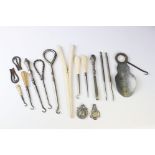 A small group of mixed collectables to include button hooks, Albert fob, tweezers, shoe horn...etc..
