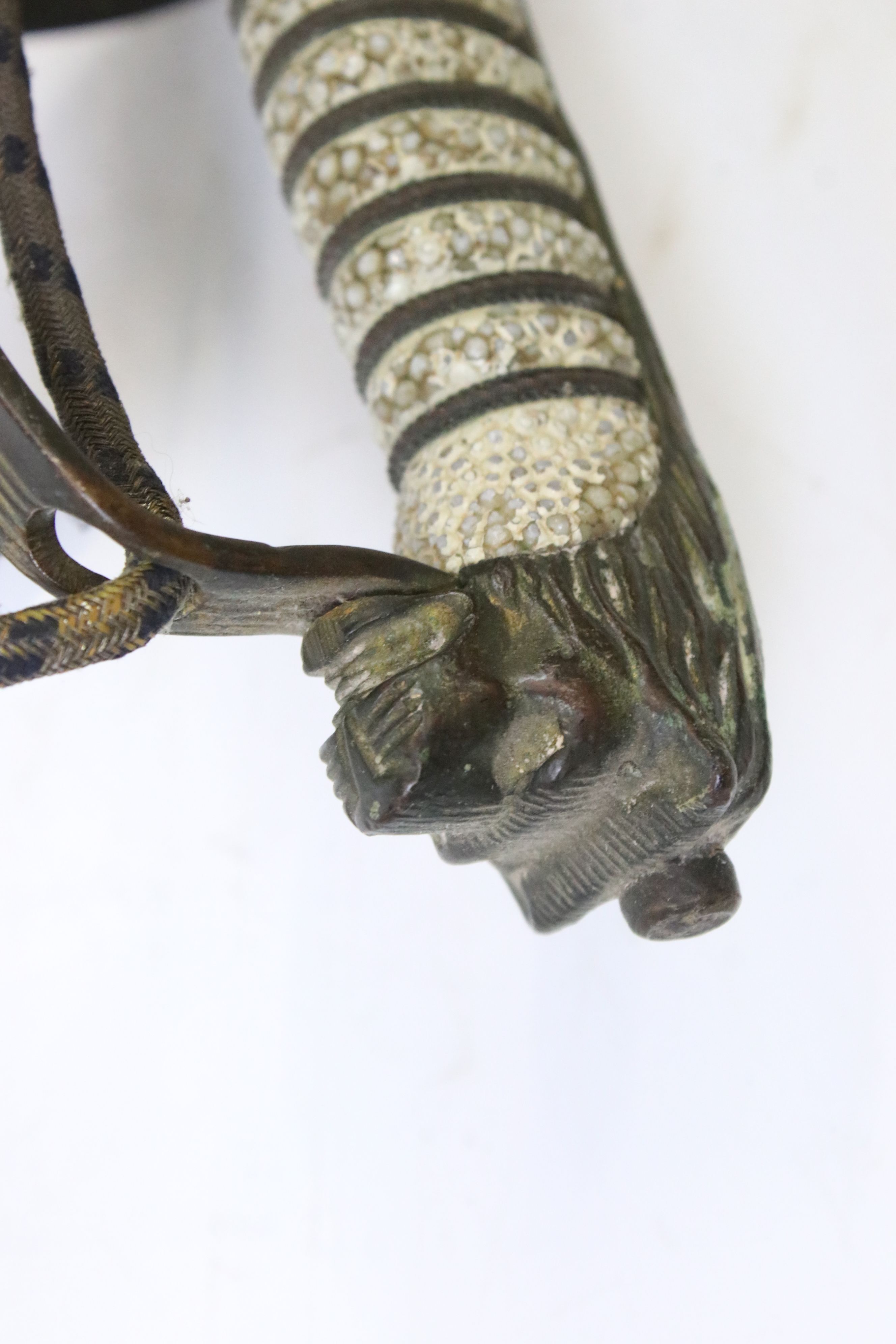 A Royal Navy officer's dress sword, lion head pommel, navy cypher with the kings crown, shagreen - Image 6 of 7