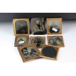 A collection of seven early Daguerreotype portrait photographs.