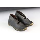 A pair of Childs antique leather clogs.