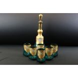 20th Century Venetian glass decanter and glasses set having blue glass bodies with gilt panelling