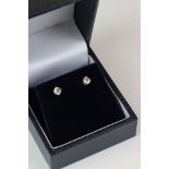 A pair of 14ct white gold diamond stud earrings of 38 points approx.