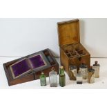 19th Century oak medicine cabinet complete with original medicine bottles, together with a walnut