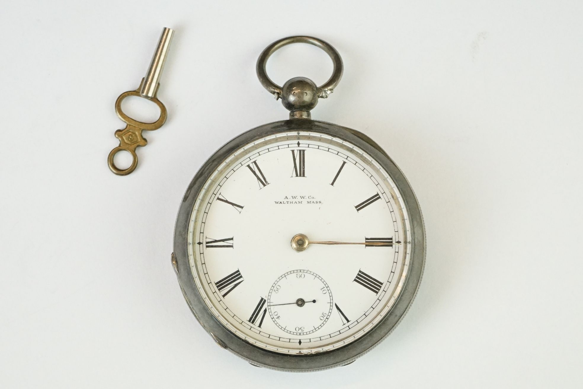 Waltham Watch Company - A late Victorian silver open faced key-wind pocket watch, white enamel dial,