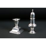 George III silver hallmarked sugar caster of baluster form with a pierced top and twist design
