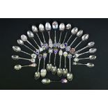 Collection of 27 British & Continental silver souvenir spoons, mostly with enamelled handle