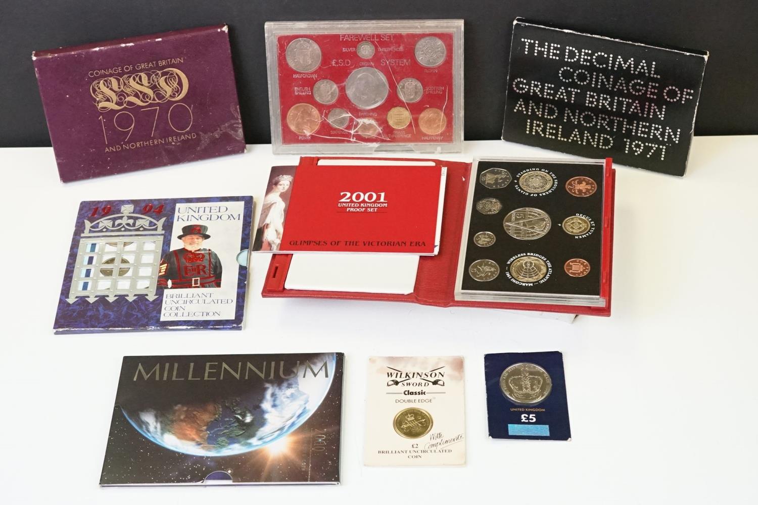 A collection of Royal Mint uncirculated coins to include 1994 year set, 1971 year set, 1970 year