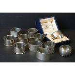 Collection of 11 silver napkin rings to include a cased Mappin & Webb Art Deco example (Birmingham