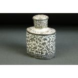 20th Century Chinese white metal tea caddy of oval form having moulded detailing to the sides