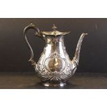 Late 19th Century Art Nouveau silver hallmarked coffee pot. The pot having repousse whiplash