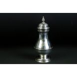George III 18th Century silver hallmarked sugar shaker of baluster form having a pierced lid with