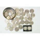 A collection of approx twenty five United States of America one dollar coins together with a
