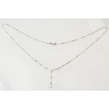Diamond 18ct white gold necklace, the principal pear shaped diamond weighing approx 0.55 carat (6.60