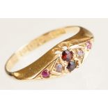 Early 20th century garnet, diamond and pink sapphire 18ct gold boat head ring, two garnets, two